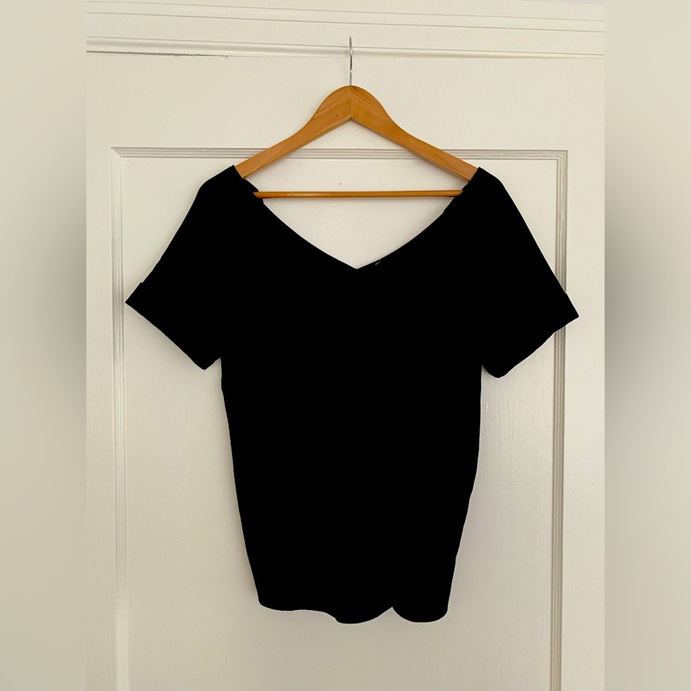 Black top with a bow in the back